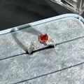 Silver open ring featuring a pomegranate red heart-shaped stone with sparkling accents - Heart-Shaped Zirconia Style (13号) / Adjustable Open / Garnet Red