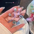 Elegant pink ribbon bow earrings with silver heart pendants and sparkling studs - Pink Bowknot Heart Rhinestone Style (E6906 Silver) / Silver