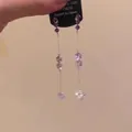 Elegant long drop earrings featuring purple crystals and a delicate silver chain - A2633 Silver