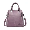 Zaino versatile in ecopelle viola di grande capacità per donna con logo a canguro e manico - Viola