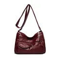 Vintage deep red faux leather crossbody bag with multiple zipper pockets and quilting - Red