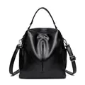 Black faux leather multi-functional women's backpack and shoulder bag with texture - Black