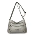 Stylish grey multi-pocket crossbody bag for women with adjustable strap and sleek design. - Light Gray