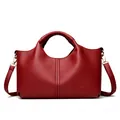 Classic red textured leather handbag with crossbody strap and top handle - Red
