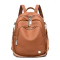 Elegant brown soft leather backpack for women with multi-pocket design and silver zippers - Yellow Brown