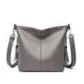 Elegant grey soft leather crossbody shoulder bag for women featuring stylish tassel detail - Light Gray