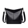 Stylish black pebbled soft leather crossbody shoulder bag with tassel details for women - Black