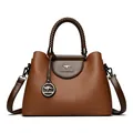 Elegant brown leather handbag with woven handle and kangaroo logo detail - Woven Handle Tote Bag / Yellow