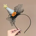 Detailed view of Halloween witch hat headband with pumpkin and glitter star accents - Black (F2007黑)