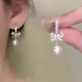Elegant French style silver bow-knot earrings with white dangling pearls for women jewelry - Bowknot Pearl Drop Style (E6071 Silver)