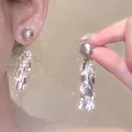 Elegant French style petal tassel earrings with grey pearls in a silver finish - Grey Pearl Silver Tassel Style (A2031 Silver)