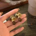 Elegant Maillard style brown acrylic flower earrings featuring dark wooden bead drops - Flower Shaped Acrylic Studs with Wood Bead (A2733)