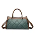 Elegant teal and brown quilted women's handbag with top handles and kangaroo logo - Green