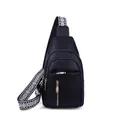 Stylish women's black pebbled leather sling bag with a wide ethnic patterned strap - Black
