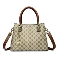 Elegant monogram print handbag with brown leather handles and a gold kangaroo charm - Cloud Pattern Khaki