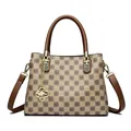 Elegant floral print handbag with brown handles and a golden kangaroo charm for women. - Checkerboard Khaki