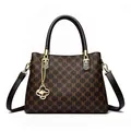 High-end brown patterned handbag with elegant gold kangaroo charm for OL commuters - Cloud Pattern Brown