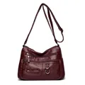 Elegant wine red soft leather crossbody bag featuring multiple pockets and adjustable strap. - Red (446-144)