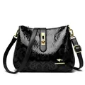 Vintage black embossed leather crossbody bag with golden kangaroo logo for women - Black