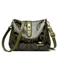 Vintage embossed crossbody shoulder bag with golden kangaroo hardware for women - Green