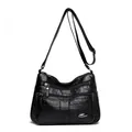 Stylish black soft leather crossbody bag for women featuring a multi-pocket design - Black