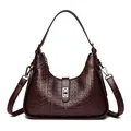 Elegant burgundy embossed underarm shoulder bag with adjustable strap and metal lock - Burgundy