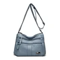 Fashionable multi-pocket women's crossbody bag in dusty blue soft faux leather finish - Blue