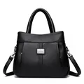 Elegant black lychee grain leather handbag featuring a detachable shoulder strap - Black