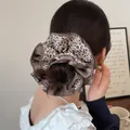 Detailed view of an oversized four-layer leopard print satin scrunchie for a hair bun - 4-Layer Scrunchie / L / Light Leopard