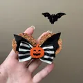 Handcrafted Halloween pumpkin hair clip featuring a striped bow and bat wing glitter details - Gold Striped Bow Style (F2006 Gold)