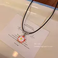 Vibrant flower pendant necklace with black cord for a trendy and sweet cool girl style - Orange Flower Style (X1893 Orange Flower)