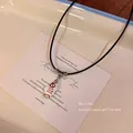 Charming white ceramic fish pendant necklace with black rope cord and vintage style - Fish Bone Style (X1893 Fish Bone)