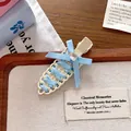 Ballet-core light blue ribbon woven hair clip with center gemstone on cream base accessory - Blue and White (Beige Clip)