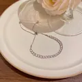 Elegant silver-plated tennis bracelet featuring cubic zirconia and adjustable sliding clasp - Tennis Bracelet Style (S175) / Silver