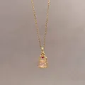 Elegant gold necklace featuring a zircon-studded gourd pendant with pink stones. - Pink Zirconia Gourd Style (X1587) / Gold