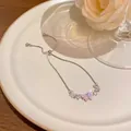 Elegant silver butterfly charm bracelet with cat's eye stone and cubic zirconia inlay. - Colorful Butterfly Style (S321) / Silver