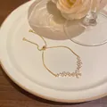 Elegant gold-plated copper bracelet with sparkling zircon and delicate bow design - Pave Bowknot Style (S758) / Gold