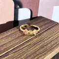 Anillo vintage dorado ajustable con flores de esmalte rosa, estilo palacio refinado. - Estilo pequeña flor de esmalte rosa (17)