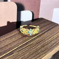Exquisito anillo abierto de oro vintage con flores de esmalte azul estilo palacio retro. - Estilo flor hueca azul-cian (20)
