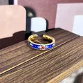 Anillo ajustable de esmalte estilo palacio vintage con acabado azul y piedra roja - Estilo Rubí Estrellado Azul (46) / Azul marino