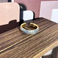 Anillo vintage de esmalte azul claro con intrincados motivos florales dorados estilo palacio - Estilo Patrón Acanto Azul Claro (49) / Azul claro