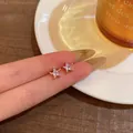 Delicate Korean style gold star stud earrings with micro-paved shimmering rhinestones - Star Style (E6418)