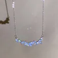 Sparkling curved zircon necklace in titanium steel, elegant silver-toned clavicle chain. - Cluster Arc Style / Silver