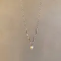 Elegant silver-toned necklace with zircon pavé V-shape and delicate pearl drop pendant - V-Shape Zirconia and Artificial Pearl Style (X1713 Silver) / Silver