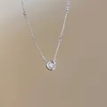 High-end titanium steel necklace with a sparkling dancing zircon circular pendant - Dancing Round Zirconia Style (X1410 Silver) / Silver