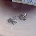 Elegant silver bowknot heart stud earrings with sparkling crystals and opalescent stone - Bowknot Heart Style