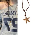 Bohemian starfish pendant long necklace with brown cord and decorative beads - Starfish Style (X1749 Brown)