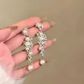 Elegant silver needle dangle earrings with pearls and crystals in a petal fringe design. - Petal Dense Diamond Flexible Tassel Style (A2352银)