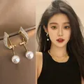 Elegant rhinestone petal stud earrings in golden finish with a white pearl drop - Dense Diamond Petal With Pearl Style (A204金)