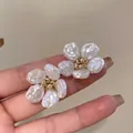Elegant baroque pearl flower stud earrings featuring silver needles for women's fashion - Baroque Irregular Pearl Petal Style (A2064白)